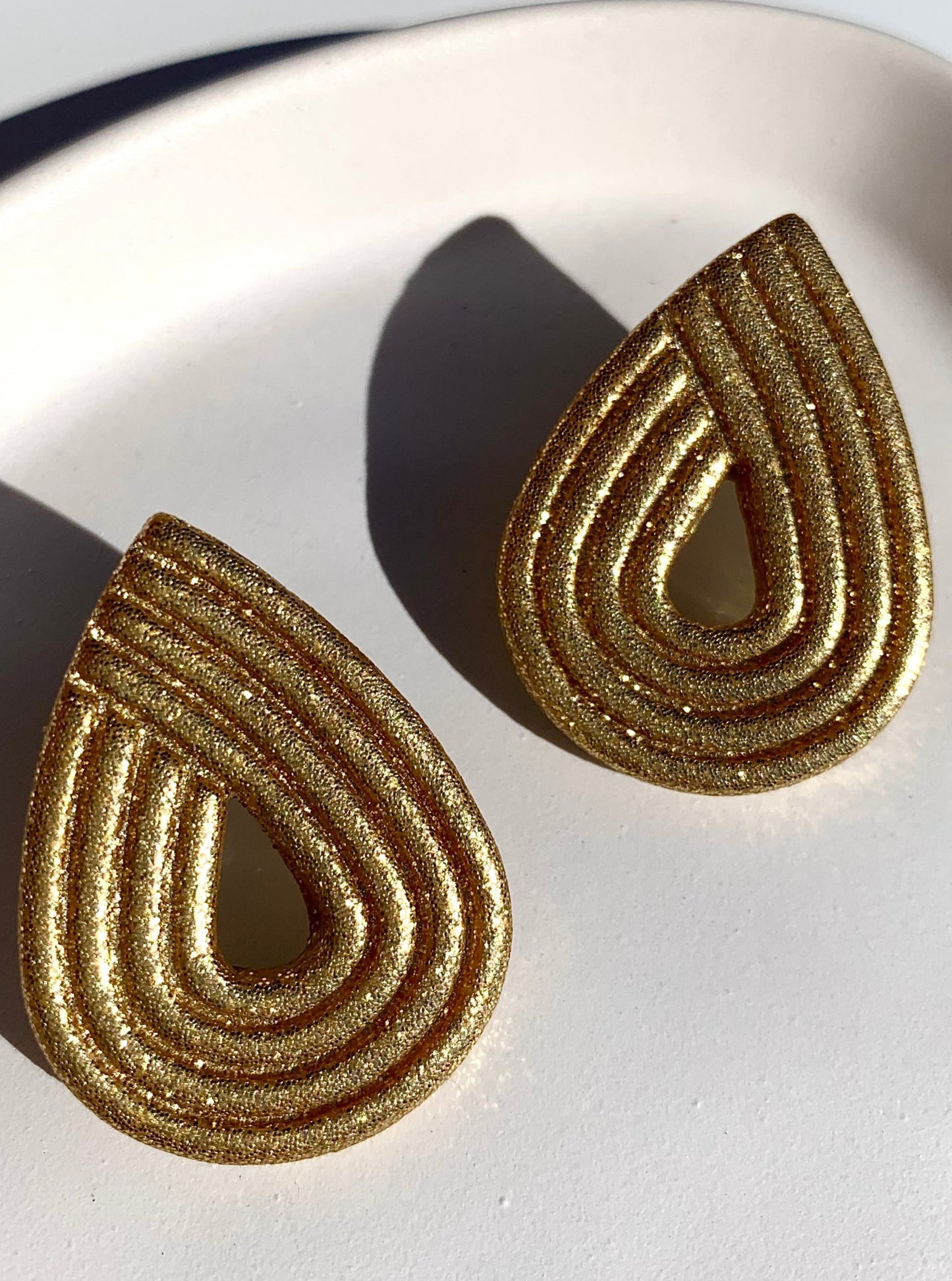 STEVIE in gold glitter